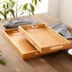 Rectangular eco-friendly bamboo serving trays.